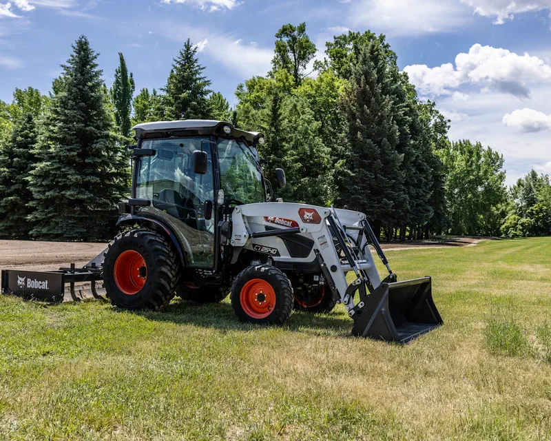 Bobcat CT2540 compact tractor with front loader and rear land grader