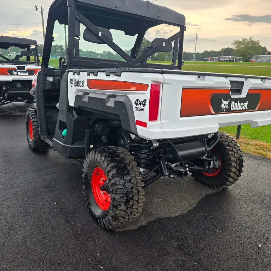 Rear three-quarter view of a Bobcat UV34 showing the 4x4 DIESEL badge on the cargo box