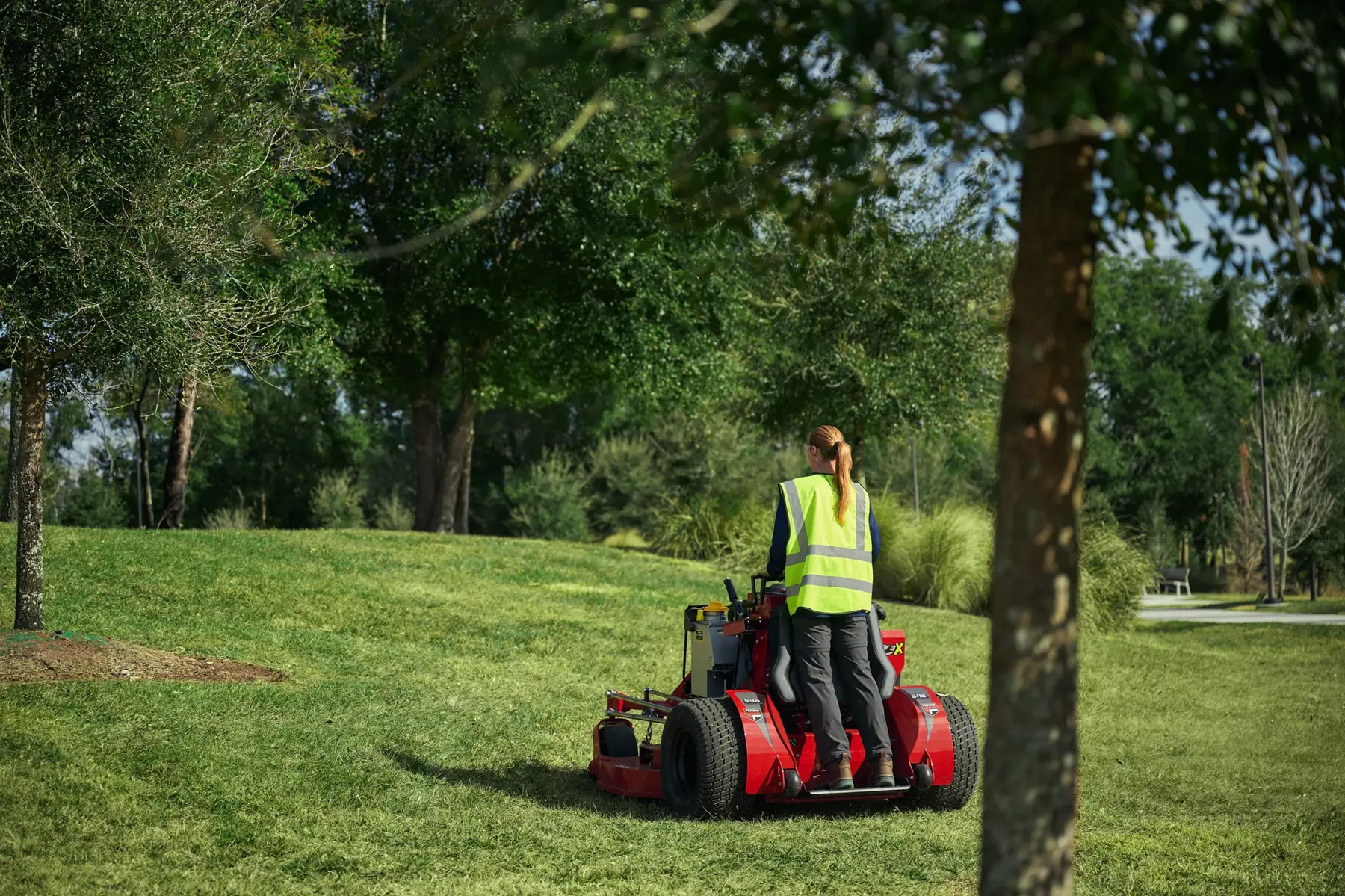 Ferris zero-turn mower cutting a large lawn
